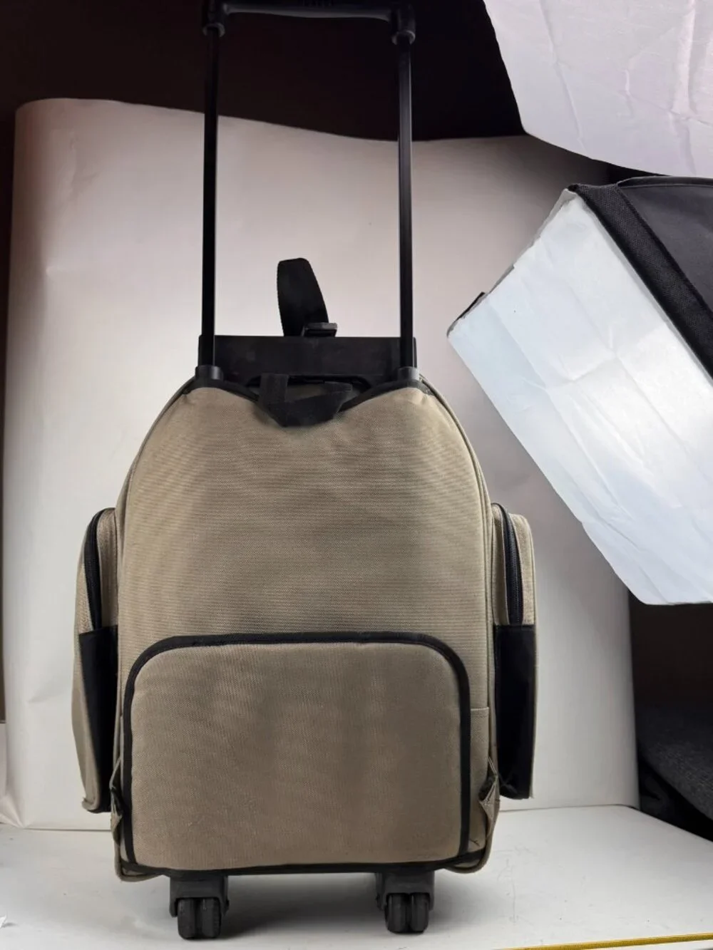 boy london rolling backpack tan wheeled suitcase travel bag tear fraying flaw